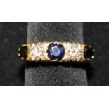 Vintage 18ct Yellow Gold Sapphire and round brilliant cut Diamond Five Stone Ring. Contains three