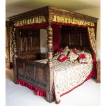 An Early Victorian Oak Four poster bed with drapes, please see photographs of the bed in situ,