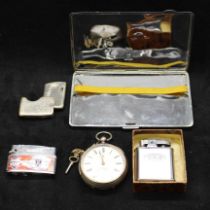 A sterling silver key-wound pocket watch along with a small collection of chrome plated smoking