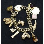 9ct Gold Charm Bracelet with 11 charms and a 22ct Gold Sovereign dated 1900 and 'P' for Perth Mint