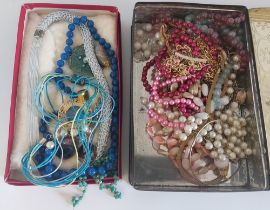 A collection of costume jewellery to include ladies watch, vintage items and hardstone necklaces to