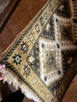 Small Persian style rugs Mustard and Lime green detail cream centre please see both Photographs 1.