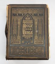 A 19th Century family bible, bound in tooled leather, hand written entries for the Oakley, Smith &