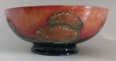 A Moorcroft Eventide pattern footed bowl, C1918 -1926 with full signature to base in Blue. Measures