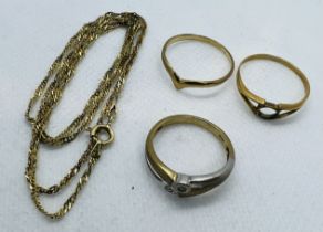 A collection of gold and yellow metal jewellery. Featuring a bi-colour 9ct gold ring, set with two