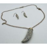 A 9ct gold jewellery set featuring a pair of cubic zirconia drop earrings and a pendant on chain