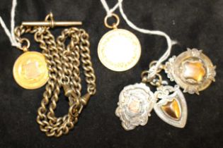 Two 9ct Gold '375' hallmarked Prize Medals. One of the medals come with a Rolled Gold Albert Chain