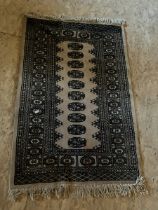 Small Persian style rug second photo is of a similar rug but shows colours 4' x 30"