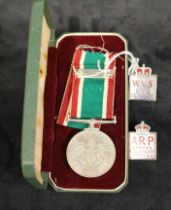 Joblot of badges and medal. Three pieces altogether.  Including: Women's Voluntary Service Medal