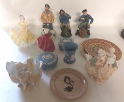 A selection of ceramics to include 2 Doulton ladies , 3 Royal Doulton sea faring figures, a pair