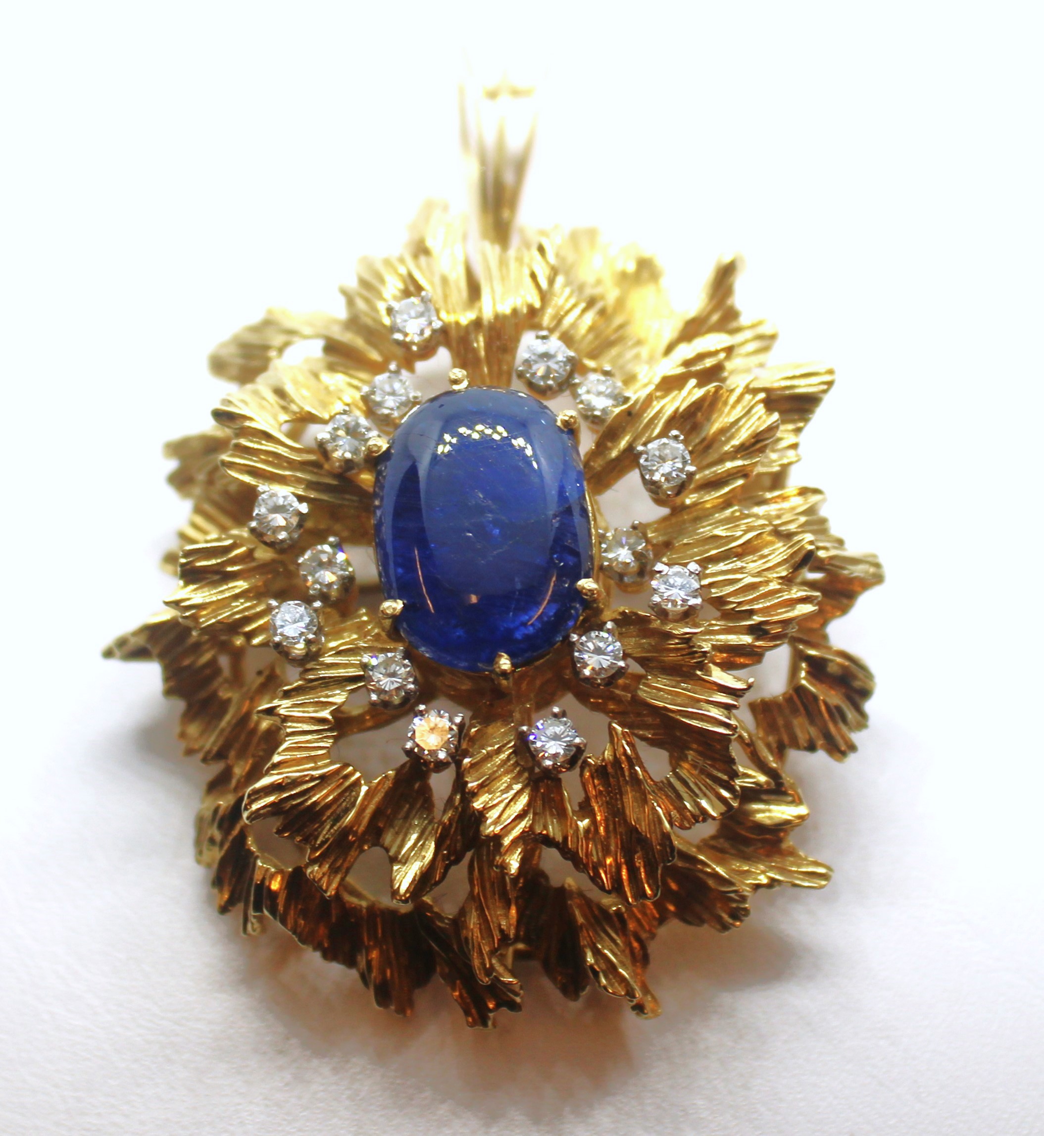 18k Yellow Gold Sapphire and Diamond Brooch.  The Cabochon Sapphire measurements are approx 19mm