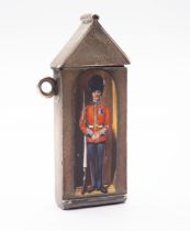 A Victorian silver and enamel novelty vesta case in the form of a sentry box with hinged cover,