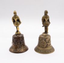 A matched pair of Dutch 17th Century bells, with cast solider handles above bodies cast with