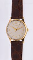 Longines- a gentleman's 9ct gold vintage wristwatch, comprising a silvered round dial with applied