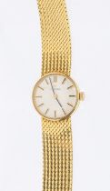 Omega- a ladies 18ct gold wristwatch, comprising a round silvered signed dial with applied gilt
