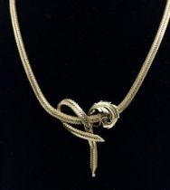 A vintage 18ct gold fancy link chain, comprising chevron style links, width approx 5mm, the front
