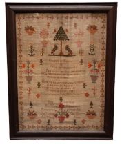 An early 19th Century needlework sampler with central verse surmounted by birds in and by a tree