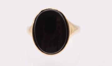 An onyx and 18ct gold Poison signet ring, comprising an oval onyx, measuring approx 16xx12mm, hinged