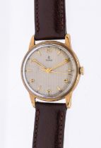 Tudor- a gentleman's 9ct gold wristwatch, circa 1950's,comprising a round signed champagne honeycomb