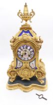 A 19th century mantle clock in the Louis XV style, gilt metal with French Sevres style porcelain