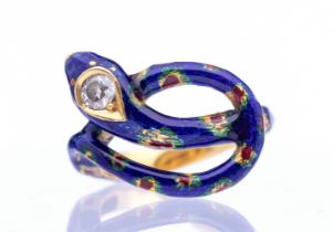 A Victorian diamond enamel 18ct gold serpent ring, comprising a coiled serpent decorated with blue