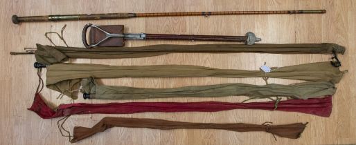 A collection of mixed early to mid 20th century fishing rods, various types and sizes, consisting of