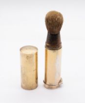 A George V silver-gilt travelling shaving brush holder and hinged cover together a scent (?)