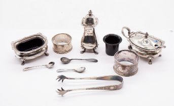 A matching George V silver three piece condiment set consisting of mustard pot with spoon and liner,