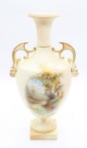 A Royal China Works Worcester blush ivory two handled urn shaped vase, with hand painted lakeside