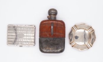 An Edwardian silver and crocodile leather mounted hip flask, the silver hallmarked by James