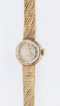 Rolex- a ladies vintage 9ct gold cocktail wristwatch, comprising a round silvered dial with