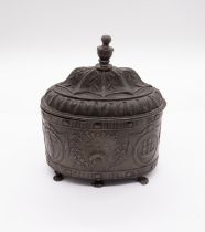 A George III oval led tobacco jar and cover, the body cast with the arms of the Borough of Leeds