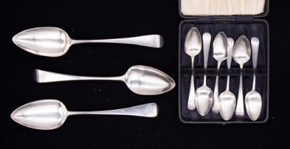 A set of three George III silver table spoons, initialled terminals and hallmarked by Samuel