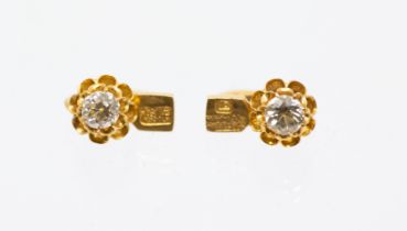 A pair of Chinese gold and diamond set earrings, each comprising an old cut diamond, combined