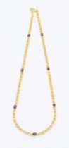 A saphire and 18ct gold station necklace, comprising seven collet set oval cabochon sapphires,