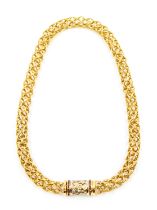 An ruby and diamond set 18ct gold chain necklace by G Graser, comprising an open tube link chain