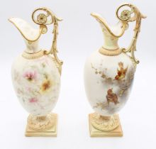 Two similar Royal China Works Worcester blush ivory handled ewers, of globular formed bodies and