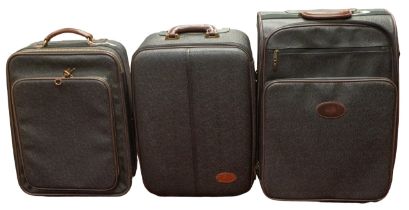 Three various Mulberry travel cases, black with dark brown trim, leather handles, approx sizes: 58cm