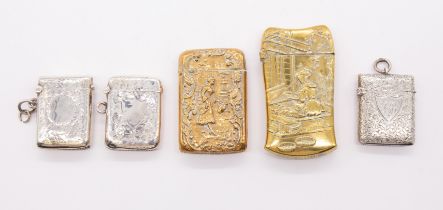 A group of three early 20th Century silver vesta cases, each profusely engraved with foliage, all