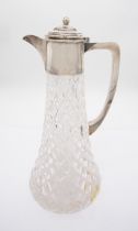 A George V plain silver mounted facet cut claret jug and cover, the silver hallmarked by James