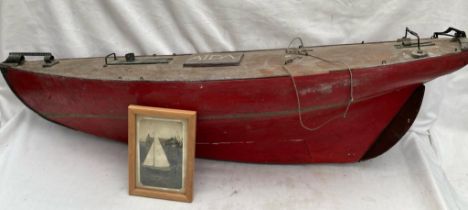 Boat: A mid 20th century, vintage metal and wooden boat, measuring approx. 36" length. Wooden