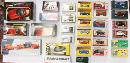 Diecast: A collection of assorted boxed modern diecast vehicles to include: Bburago, Vanguards,