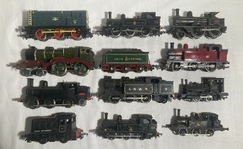 Railway: A collection of eleven unboxed assorted locomotives, some kit built, some overpainted.