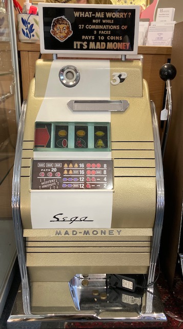 Sega: A Sega Mad Money, operating on 3d, one arm bandit, vintage coin operated amusement machine.