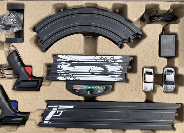 Scalextric: A collection of three boxed Scalextric sets, two James Bond 007 Micro Scalextric sets - Image 3 of 4