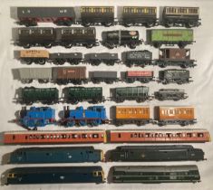 Railway: A collection of assorted OO gauge trucks along with Thomas the Tank Engine with two coaches