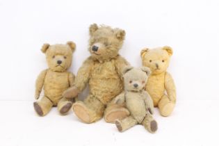Bears: A collection of four vintage mid-20th century bears, unmarked, one with musical addition