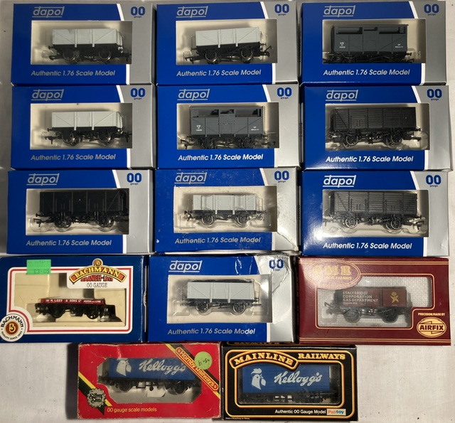 Railway: A collection of fourteen boxed OO gauge trucks, mostly Dapol but Mainline, Bachmann and