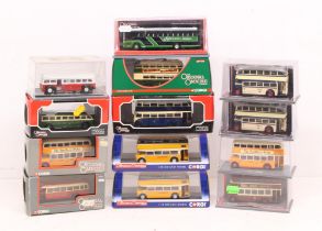 Corgi: A collection of thirteen (13) cased Corgi: The Original Omnibus Company vehicles. All