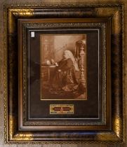 HM Queen Victoria (1819-1901). Autograph, signed in bold black ink on sepia photographic portrait,